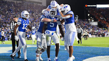 Darius Lassiter celebrates a game-winning touchdown in the final moment of BYU's comeback victory over Oklahoma State.