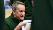 Mar 23, 2025; Seattle, WA, USA; Colorado State Rams head coach Niko Medved leads a team huddle against the Maryland Terrapins in the first half at Climate Pledge Arena. Mandatory Credit: Steven Bisig-Imagn Images