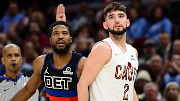 Jan 27, 2025; Cleveland, Ohio, USA; Detroit Pistons guard Malik Beasley (5) and Cleveland Cavaliers guard Ty Jerome (2) watch Jerome’s shot during the second half at Rocket Mortgage FieldHouse.