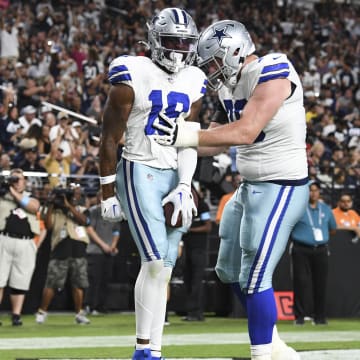 Aug 17, 2024; Paradise, Nevada, USA; Dallas Cowboys wide receiver Ryan Flournoy (18) celebrates scoring a touchdown with offensive tackle Matt Waletzko (79) in the second quarter against the Las Vegas Raiders at Allegiant Stadium. 