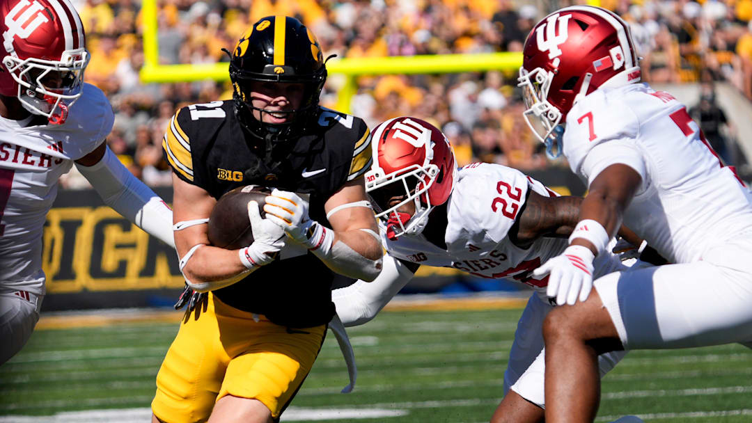 Iowa Hawkeyes wide receiver Kaden Wetjen (21) runs with the ball against the Indiana Hoosiers Sept. 27, 2025 at Kinnick Stadium in Iowa City, Iowa.