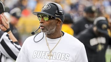 Nov 8, 2025; Morgantown, West Virginia, USA; Colorado Buffaloes head coach Deion Sanders walks along the sidelines late in the fourth quarter against the West Virginia Mountaineers at Milan Puskar Stadium.