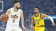 Cleveland Cavaliers guard Ty Jerome dribbles beside Indiana Pacers guard Tyrese Haliburton in the 2025 NBA Playoffs