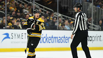 Feb 27, 2025; Boston, Massachusetts, USA; Boston Bruins left wing Brad Marchand (63) reacts to a a penalty call during the third period against the New York Islanders at TD Garden. Mandatory Credit: Bob DeChiara-Imagn Images