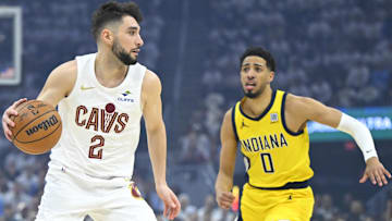 Cleveland Cavaliers guard Ty Jerome dribbles beside Indiana Pacers guard Tyrese Haliburton in the 2025 NBA Playoffs