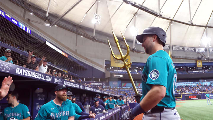 Seattle Mariners catcher Cal Raleigh (29) is congratulated after he hit a home run against the Tampa Bay Rays during the fourth inning at Tropicana Field on June 24.