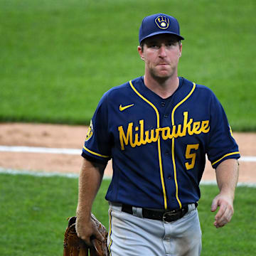 Jul 22, 2020; Chicago, Illinois, USA; Milwaukee Brewers third baseman Jedd Gyorko (5) reacts during the third inning against the Chicago White Sox at Guaranteed Rate Field.