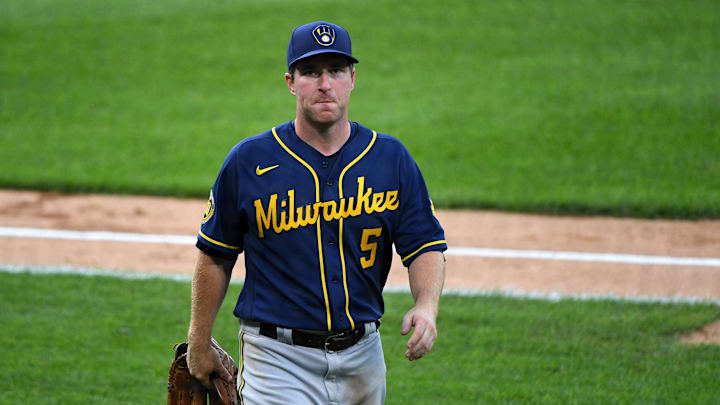 Jul 22, 2020; Chicago, Illinois, USA; Milwaukee Brewers third baseman Jedd Gyorko (5) reacts during the third inning against the Chicago White Sox at Guaranteed Rate Field.