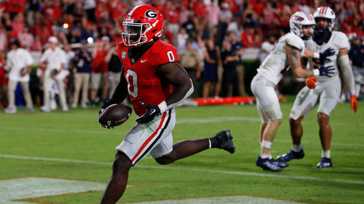 Georgia running back Roderick Robinson II (0) drives in for a touchdown during the second half of a NCAA college football game against Tennessee Martin in Athens, Ga., on Saturday, Sept. 2, 2023. Georgia won 48-7.