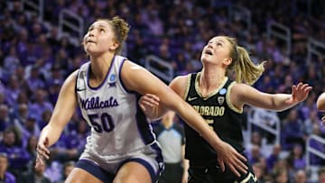 Mar 24, 2024; Manhattan, Kansas, USA; Kansas State Wildcats center Ayoka Lee (50) blocks out Colorado Buffaloes guard Kindyll Wetta (15) during the fourth quarter at Bramlage Coliseum. Mandatory Credit: Scott Sewell-Imagn Images