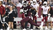 Texas A&M Aggies running back Amari Daniels (5) runs the ball during the first half against the New Mexico State Aggies at Kyle Field. 