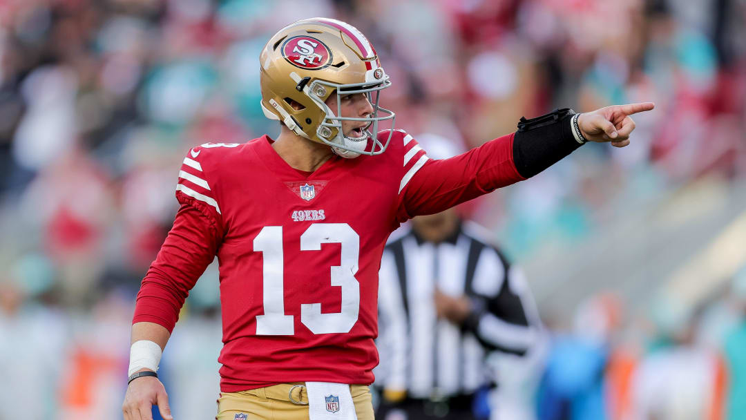 Dec 4, 2022; Santa Clara, California, USA; San Francisco 49ers quarterback Brock Purdy (13) celebrates after throwing a touchdown pass during the second quarter against the Miami Dolphins at Levi's Stadium. Mandatory Credit: Sergio Estrada-USA TODAY Sports