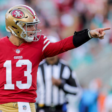 Dec 4, 2022; Santa Clara, California, USA; San Francisco 49ers quarterback Brock Purdy (13) celebrates after throwing a touchdown pass during the second quarter against the Miami Dolphins at Levi's Stadium. Mandatory Credit: Sergio Estrada-USA TODAY Sports