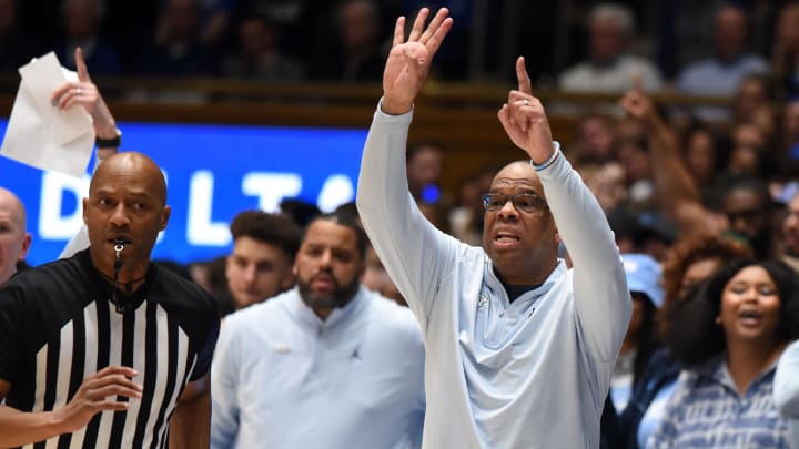 UNC basketball head coach Hubert Davis versus Duke