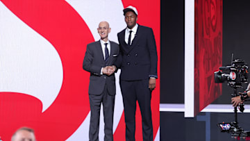 Jun 25, 2025; Brooklyn, NY, USA;  Derik Queen stands with NBA commissioner Adam Silver after being selected as the 13th pick by the Atlanta Hawks in the first round of the 2025 NBA Draft at Barclays Center. Mandatory Credit: Brad Penner-Imagn Images