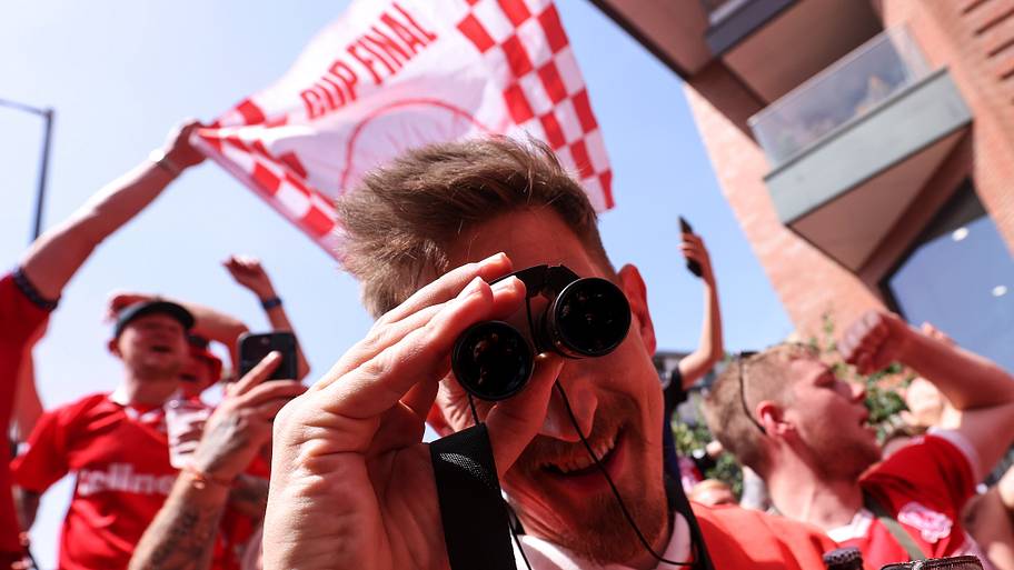 A Middlesbrough fan who bears a striking resemblance to a cartoon character from Tim Burton’s imagination peers at a camera.