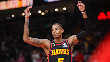 Atlanta Hawks guard Dejounte Murray celebrates after a three-pointer against the Cleveland Cavaliers in the second quarter
