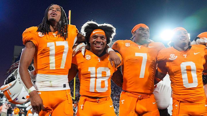 Tennessee wide receiver Chris Brazzell II (17), running back DeSean Bishop (18), linebacker Arion Carter (7) and defensive back William Wright (0) celebrate after the Vols defeated Mississippi State in overtime at Davis Wade Stadium in Starkville, Miss., on Sept. 27, 2025.