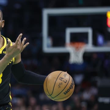 Mar 29, 2024; Charlotte, North Carolina, USA; Golden State Warriors guard Chris Paul (3) directs the offense against the Charlotte Hornets during the second half at Spectrum Center. Mandatory Credit: Nell Redmond-USA TODAY Sports