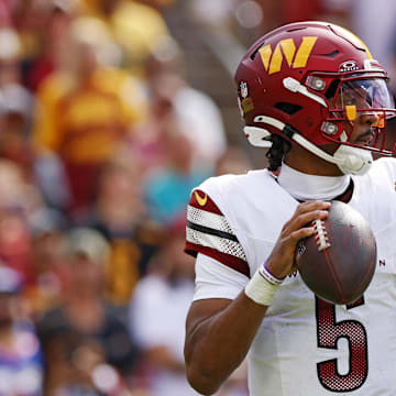 Sep 7, 2025; Landover, Maryland, USA; Washington Commanders quarterback Jayden Daniels (5) makes a pass during the fourth quarter against the New York Giants at Northwest Stadium. Mandatory Credit: Peter Casey-Imagn Images