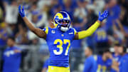 Jan 13, 2025; Glendale, AZ, USA; Los Angeles Rams safety Quentin Lake (37) reacts during the second half against the Minnesota Vikings in an NFC wild card game at State Farm Stadium. Mandatory Credit: Mark J. Rebilas-Imagn Images