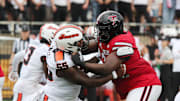Sep 13, 2025; Lubbock, Texas, USA;   Oregon State Beavers offensive lineman Van Wells (55) blocks Texas Tech Red Raiders defensive guard Lee Hunter (2) in the first half at Jones AT&T Stadium. Mandatory Credit: Michael C. Johnson-Imagn Images