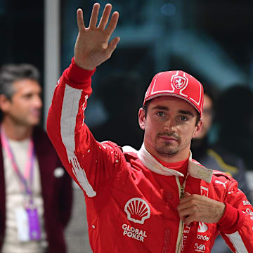 Nov 17, 2023; Las Vegas, Nevada, USA; Scuderia Ferrari driver Charles LeClerc of Monaco (16) celebrates after securing pole position during qualifying at Las Vegas Strip Circuit. Mandatory Credit: Gary A. Vasquez-Imagn Images