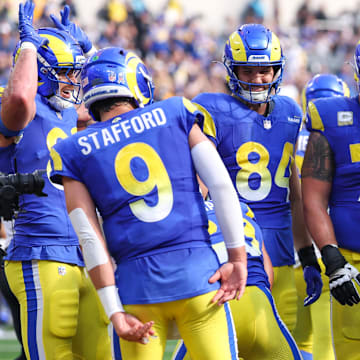 Nov 2, 2025; Inglewood, California, USA; Los Angeles Rams wide receiver Davante Adams (17) reacts with quarterback Matthew Stafford (9) and  teammates after catching a touchdown against the New Orleans Saints during the first half at SoFi Stadium. Mandatory Credit: Kiyoshi Mio-Imagn Images