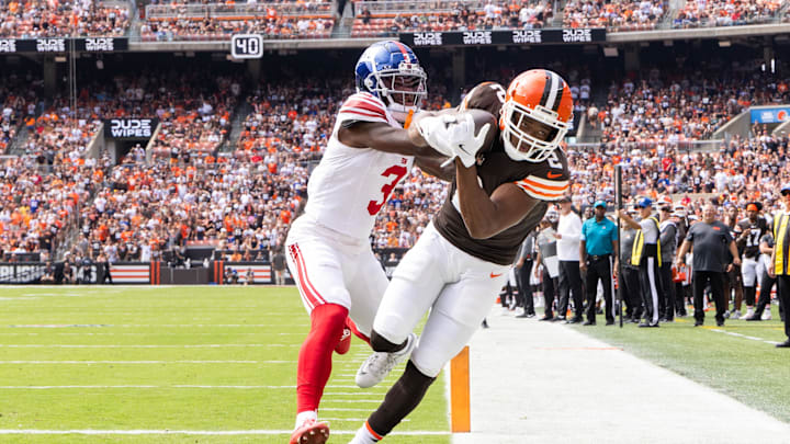Sep 22, 2024; Cleveland, Ohio, USA; Cleveland Browns wide receiver Amari Cooper (2) makes a touchdown reception under coverage by New York Giants cornerback Deonte Banks (3) during the first quarter at Huntington Bank Field. Mandatory Credit: Scott Galvin-Imagn Images Sep 22, 2024; Cleveland, Ohio, USA; Cleveland Browns wide receiver Amari Cooper (2) makes a touchdown reception under coverage by New York Giants cornerback Deonte Banks (3) during the first quarter at Huntington Bank Field. Mandatory Credit: Scott Galvin-Imagn Images