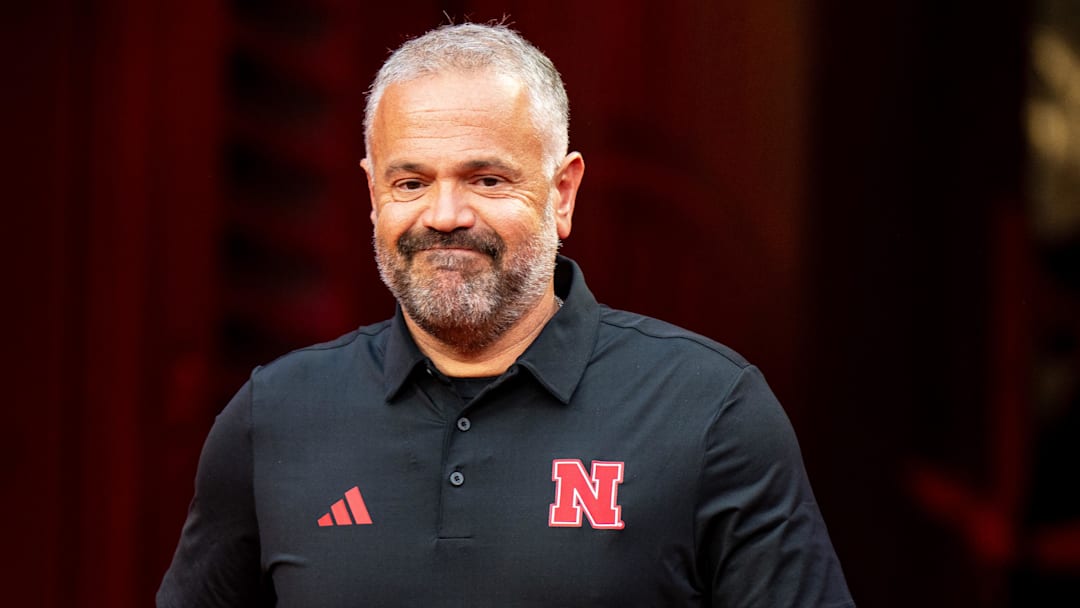 Aug 28, 2025; Kansas City, Missouri, USA; Nebraska Cornhuskers head coach Matt Rhule walks onto the field during warmups before the game against the Cincinnati Bearcats.
