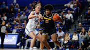 Jan 11, 2025; Colorado Springs, Colorado, USA; San Jose State Spartans center Robert Vaihola (22) controls the ball as Air Force Falcons center Wesley Celichowski (51) guards in the first half at Clune Arena. Mandatory Credit: Isaiah J. Downing-Imagn Images