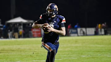 Nashville Christian quarterback Jared Curtis (2) runs the ball in for the go-ahead touchdown with 50 second left in game against Tyner Friday, Oct. 10, 2025, in Nashville, Tenn.