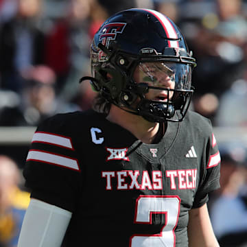 Nov 30, 2024; Lubbock, Texas, USA;  Texas Tech Red Raiders quarterback Behren Morton (2) in the first half during the game against the West Virginia Mountaineers at Jones AT&T Stadium and Cody Campbell Field. Mandatory Credit: Michael C. Johnson-Imagn Images