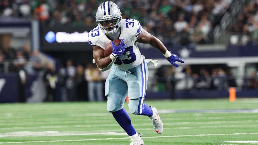 Nov 23, 2025; Arlington, Texas, USA; Dallas Cowboys running back Javonte Williams (33) runs with the ball in the second quarter against the Philadelphia Eagles at AT&T Stadium. Mandatory Credit: Kevin Jairaj-Imagn Images
