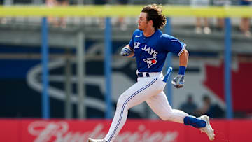 Mar 8, 2023; Dunedin, Florida, USA;  Toronto Blue Jays third baseman Addison Barger (44) doubles