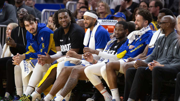 Apr 14, 2024; San Francisco, California, USA; The Golden State Warriors bench watches the closing minutes against the Utah Jazz during the fourth quarter at Chase Center. Mandatory Credit: D. Ross Cameron-USA TODAY Sports