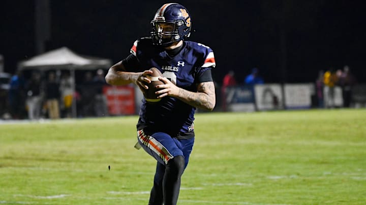 Nashville Christian quarterback Jared Curtis (2) runs the ball in for the go-ahead touchdown with 50 second left in game against Tyner Friday, Oct. 10, 2025, in Nashville, Tenn.
