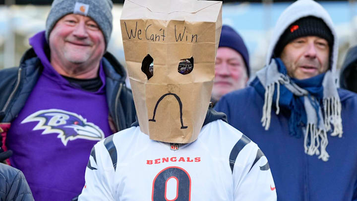 Cold Bengals fans look on in the fourth quarter of the NFL Week 15 game between the Cincinnati Bengals and the Baltimore Ravens at Paycor Stadium in Cincinnati on Sunday, Dec. 14, 2025. The Bengals were shut out, 24-0.