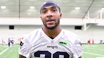 Jun 10, 2025; Foxborough, MA, USA; New England Patriots running back TreVeyon Henderson (32) speaks to the media after minicamp held in the WIN Field House at Gillette Stadium. Mandatory Credit: Eric Canha-Imagn Images