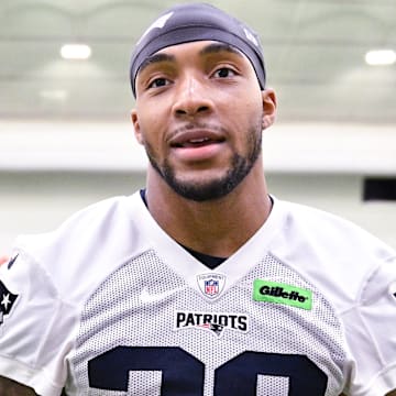 Jun 10, 2025; Foxborough, MA, USA; New England Patriots running back TreVeyon Henderson (32) speaks to the media after minicamp held in the WIN Field House at Gillette Stadium. Mandatory Credit: Eric Canha-Imagn Images