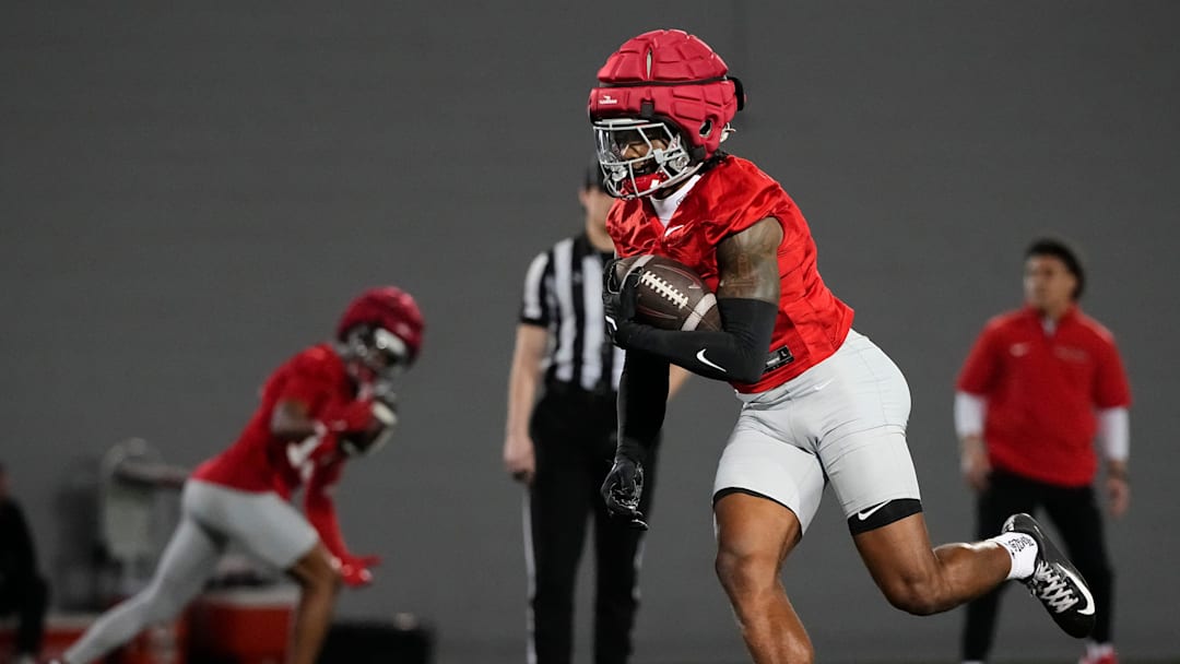 Ohio State Buckeyes wide receiver Jeremiah Smith (4) fields a punt during spring football practice at the Woody Hayes Athletic Center in Columbus on March 19, 2025.
