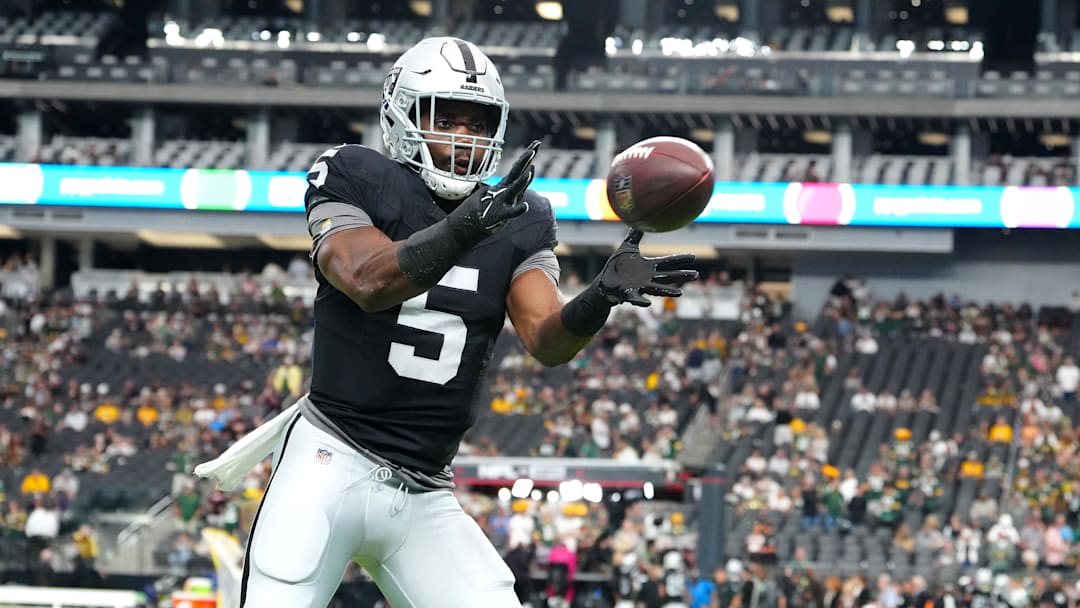 Oct 9, 2023; Paradise, Nevada, USA; Las Vegas Raiders linebacker Divine Deablo (5) warms up before a game against the Green Bay Packers at Allegiant Stadium. Mandatory Credit: Stephen R. Sylvanie-Imagn Images