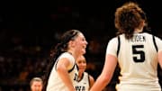 Iowa guard Taylor McCabe (2) high-fives Iowa center Ava Heiden (5) Nov. 3, 2025 during a women’s college basketball game against the Southern Jaguars at Carver-Hawkeye Arena in Iowa City, Iowa.