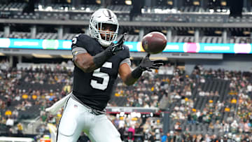 Oct 9, 2023; Paradise, Nevada, USA; Las Vegas Raiders linebacker Divine Deablo (5) warms up before a game against the Green Bay Packers at Allegiant Stadium. Mandatory Credit: Stephen R. Sylvanie-Imagn Images