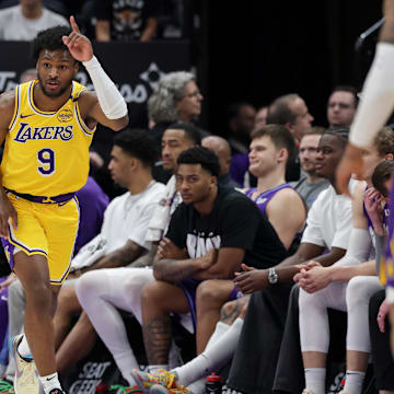 Feb 12, 2025; Salt Lake City, Utah, USA: Los Angeles Lakers guard Bronny James (9) celebrates after making a three point basket during the second half against the Utah Jazz at Delta Center. Mandatory Credit: Chris Nicoll-Imagn Images