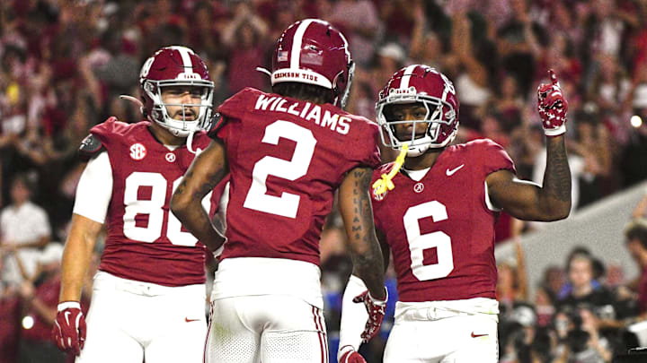 Alabama Crimson Tide wide receiver Kobe Prentice (6) celebrates with tight end Josh Cuevas (80) and wide receiver Ryan Williams (2) after a touchdown against the South Florida Bulls at Bryant-Denny Stadium. Alabama won 42-16. 