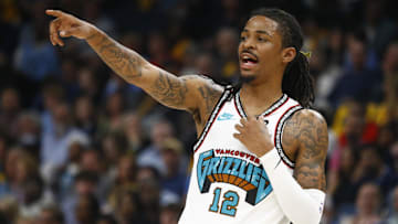 Apr 18, 2025; Memphis, Tennessee, USA; Memphis Grizzlies guard Ja Morant (12) reacts during the second quarter against the Dallas Mavericks at FedExForum. Mandatory Credit: Petre Thomas-Imagn Images