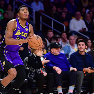Feb 6, 2025; Los Angeles, California, USA; Los Angeles Lakers forward Rui Hachimura (28) shoots against the Golden State Warriors during the first half at Crypto.com Arena. Mandatory Credit: Gary A. Vasquez-Imagn Images