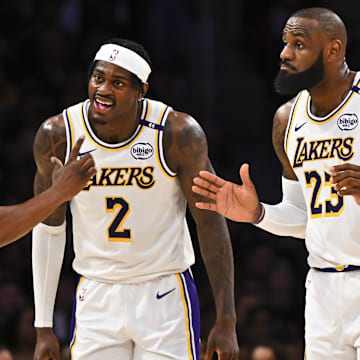 Mar 22, 2025; Los Angeles, California, USA; Los Angeles Lakers forward Jarred Vanderbilt (2) and Los Angeles Lakers forward LeBron James (23) react to a call from referee Courtney Kirkland (61) against the Chicago Bulls during the first half at Crypto.com Arena. Mandatory Credit: Jonathan Hui-Imagn Images