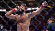 Oct 5, 2024; Salt Lake City, Utah, USA; Roman Dolidze (red gloves) reacts after defeating Kevin Holland (not pictured) during UFC 307 at Delta Center. Mandatory Credit: Stephen R. Sylvanie-Imagn Images